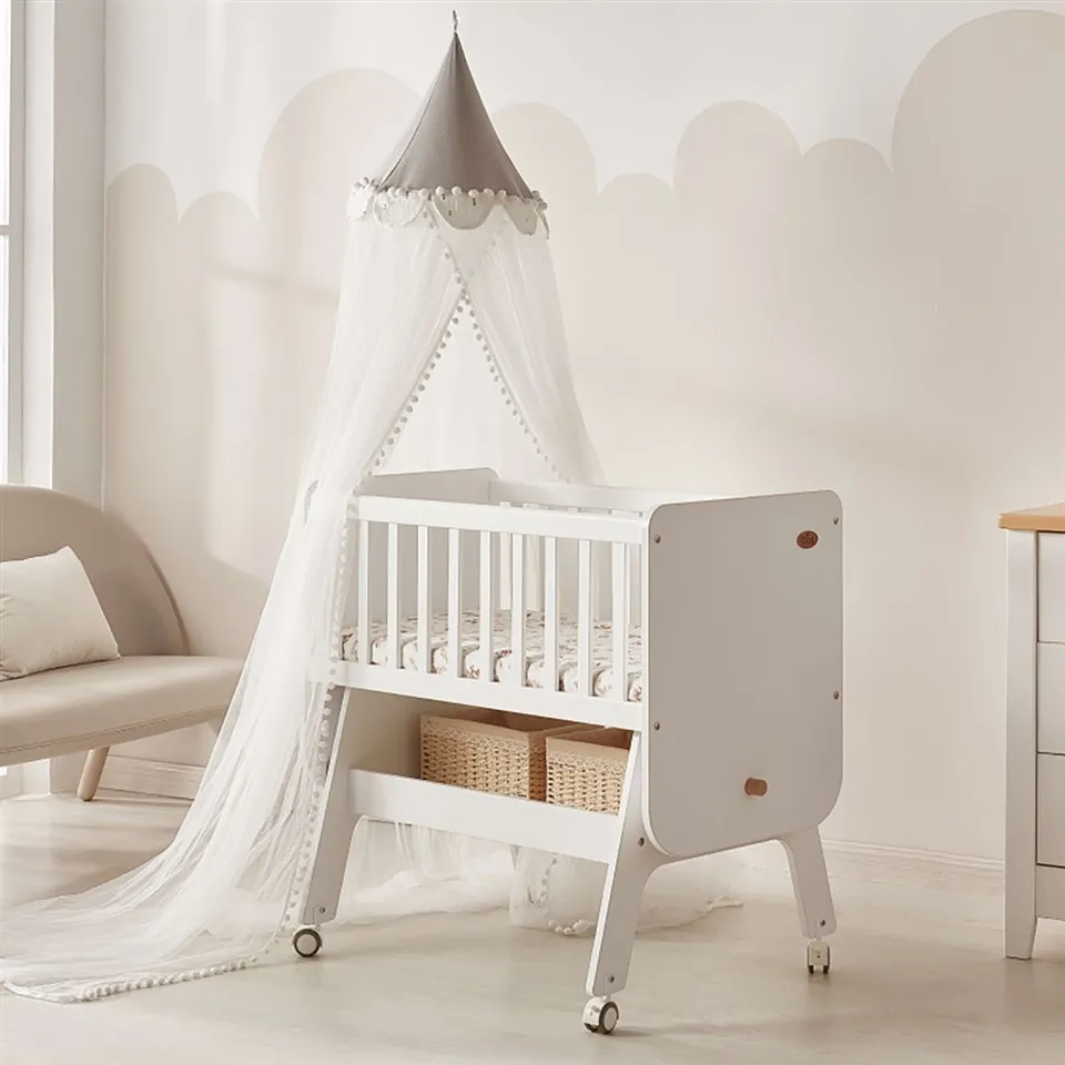 Cuna mecedora de madera